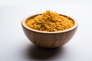 Aloo Bhujiya or Potato Bhujia also known as Namkeen sev. Popular Bikaneri recipe served in a bowl or plate. selective focus