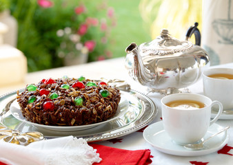 Chocolate and glacied Cherry cake. Tea setting patio/Garden