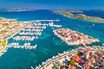 Dalmatian town of Tribunj and amazing turquoise archipelago aerial view