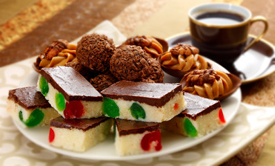 Fototapeta na wymiar various homemade sweet cakes/fancies to have with coffee