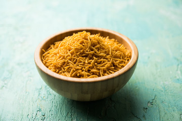 Aloo Bhujiya or Potato Bhujia also known as Namkeen sev. Popular Bikaneri recipe served in a bowl or plate. selective focus