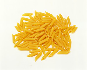 Pile of uncooked Penne Pasta on white background