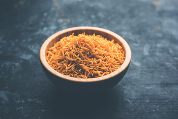 Aloo Bhujiya or Potato Bhujia also known as Namkeen sev. Popular Bikaneri recipe served in a bowl or plate. selective focus