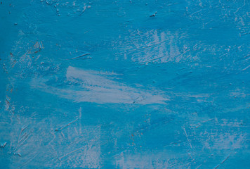 Background in the form of a wooden surface, first putty, and then painted blue with light spots