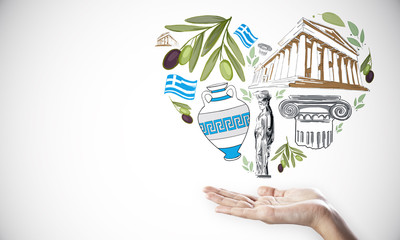 Travel to Greece concept with human palm and heart shaped greek traditional symbols.