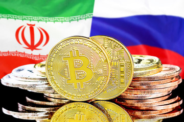 Concept for investors in cryptocurrency and Blockchain technology in the Iran and Russia. Bitcoins on the background of the flag Iran and Russia.