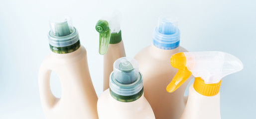 Set of blank label bottles for mockup packaging of cleaning detergent on blue white background....