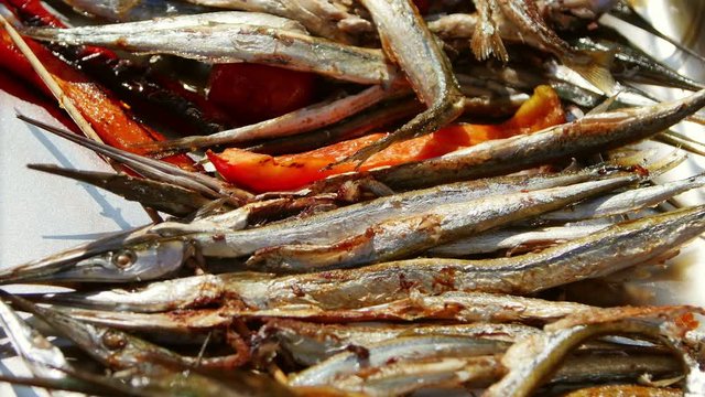 Freshly cooked garfish on a sheet pan