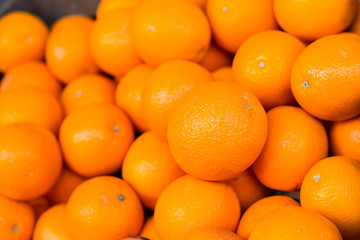 Healthy organic oranges. Top view of ripe tangerines background. Fresh mandarin texture