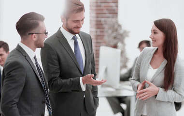 Young business woman introduces herself to client.