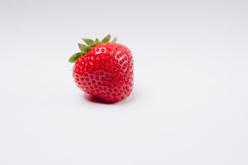 red tasty strawberries on a white background