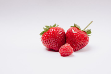 red tasty strawberries on a white background