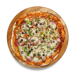 Appetizing pizza on a wooden board isolated on a white background. Top view.
