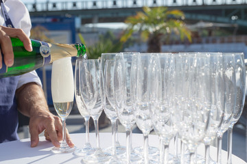 Champagne wine serving outdoor sun close-up