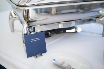 Catering buffet dishes plates table service with menu card