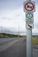 Yellowknife,Canada-September 1, 2019: No snowmobile and Shared Pathway sign along 48th street in Yellowknife, Canada