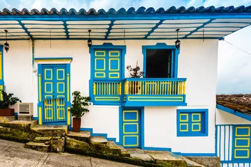 Fototapeten View on colourful colonial balcony of old town of Salento in Colombia © streetflash