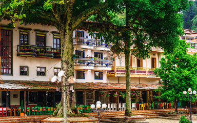 View on colorful colonial buildings at central square of village Jerico in Colombia