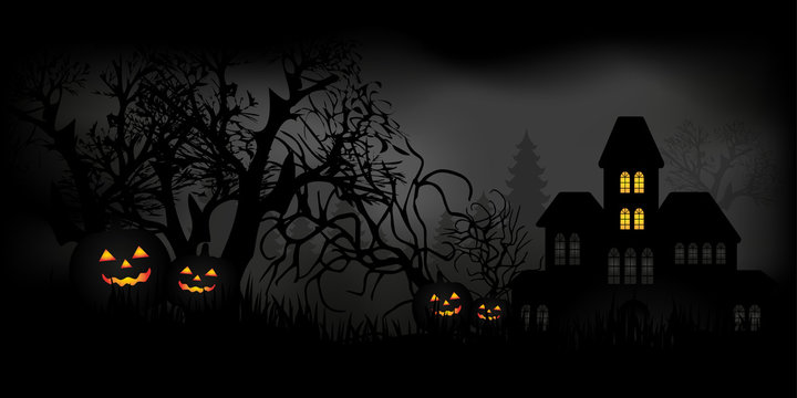 Halloween night with candles, pumpkins and haunted house in a mysterious forest