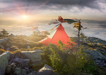 flags in the wind in the mountains