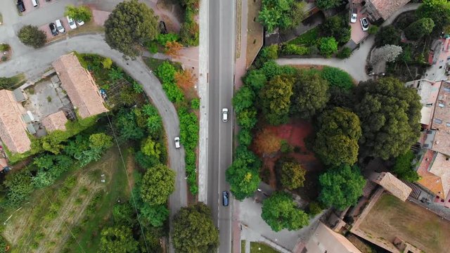 Aerial road from vignola to savignano with cars and Panaro river Vignola September 2019 Modena Emilia Romagna Italy 4K