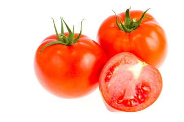 Ripe juicy red tomatoes isolated on white background.