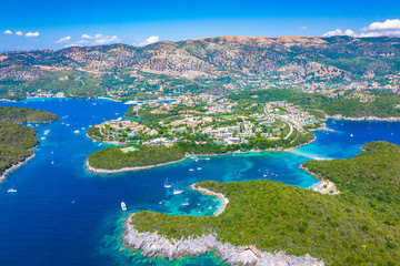 Aerial view of iconic paradise sandy beaches with turquoise sea in complex islands of Agios...