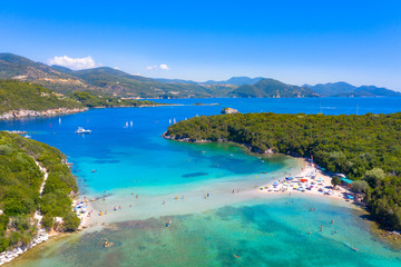 Aerial view of iconic paradise sandy beaches with turquoise sea in complex islands of Agios Nikolaos and Mourtos in Sivota area, Epirus, Greece