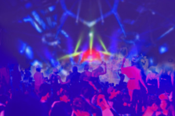 Blur photo abstract disco lights,having fun in night club in bright red laser light, active night life