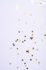 Festive background. Shining stars on white background. Christmas. Wedding. Birthday. Happy woman's day. Mothers Day. Valentine's Day. Flat lay, top view, copy space.