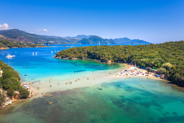 Aerial view of iconic paradise sandy beaches with turquoise sea in complex islands of Agios Nikolaos and Mourtos in Sivota area, Epirus, Greece