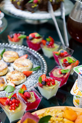 Sweet milk and berry desserts at breakfast buffet in a hotel