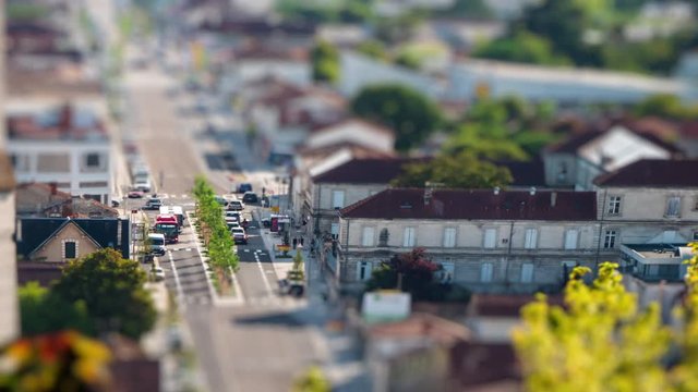Tilt shift Angouleme City Traffic Timelapse. Cars, bus, and people at daylight