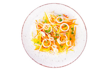 Fresh carrot and leek salad on white ceramic plate