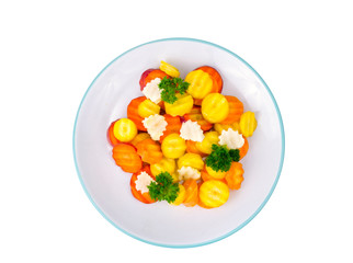 Tasty vegetarian salad of colorful carrots on white background.