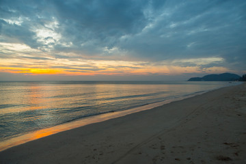 Siluette sunset at the beach background