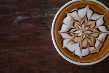 Cup of coffee with  latte art on top