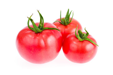 Fresh red and pink tomatoes isolated on white background