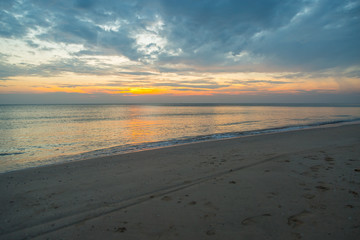 Siluette sunset at the beach background