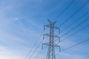 High voltage post tower with blue sky