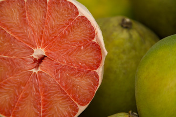Green fresh red grapefruit slice organic nature