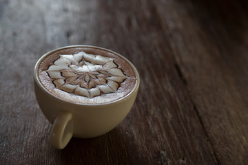 Cup of coffee with  latte art on top