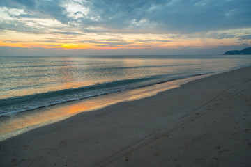 Siluette sunset at the beach background