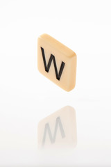 Alphabet W word block with white background.