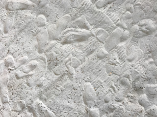 Footprints on white sand