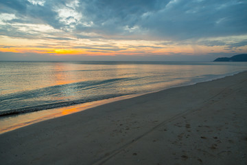Siluette sunset at the beach background