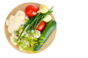 Obraz na płótnie Canvas Homemade organic seasonal vegetables on wooden plate