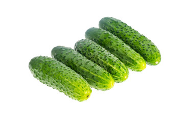 Bunch of fresh green cucumbers isolated on white background