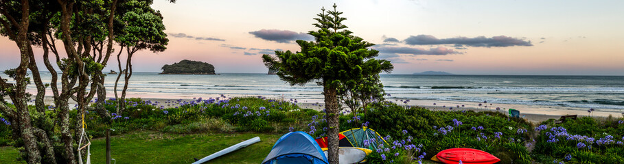 Beautiful sunset at Whangamata beach, North Island, New Zealand.