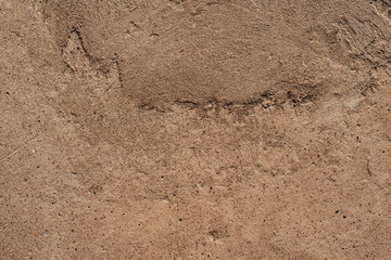 Texture of a concrete wall with cracks and scratches which can be used as a background